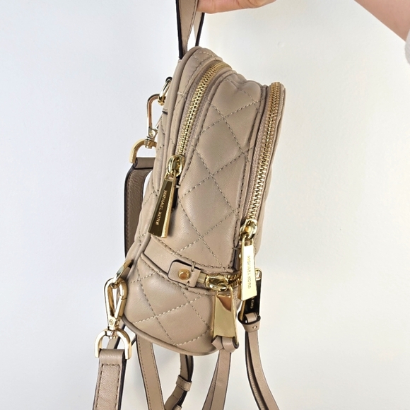 Michael Kors Cream Quilted Backpack with Gold Accents - Picture 8 of 17